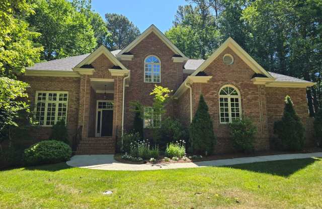 Custom Brick Home on Private Wooded Lot in Cary's Prestigious Wessex Community photos photos