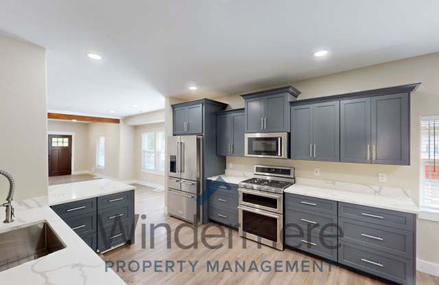 609 Pleasant St. - Well Equipped Kitchen, Finished Basement with Wet Bar Gallery 1