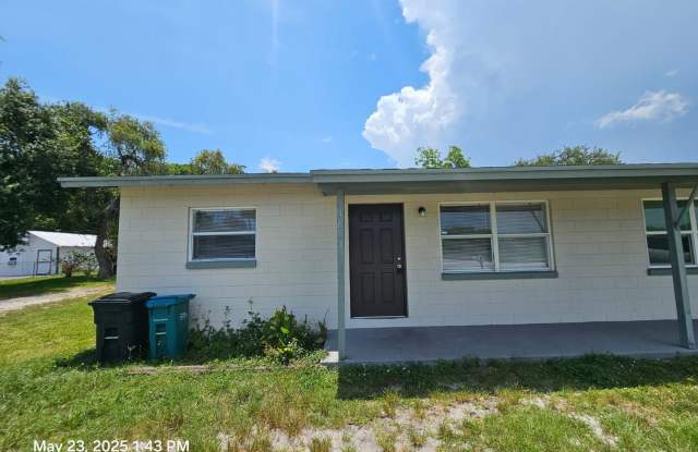 Charming 2-bedroom, 1-bath residence featuring tile flooring throughout. photos photos