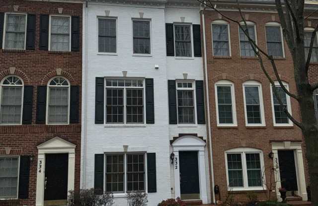 Beautiful 4BR 4.5BA 4 level townhome with 2 car attached garage located in the Fallsgrove Community photos photos