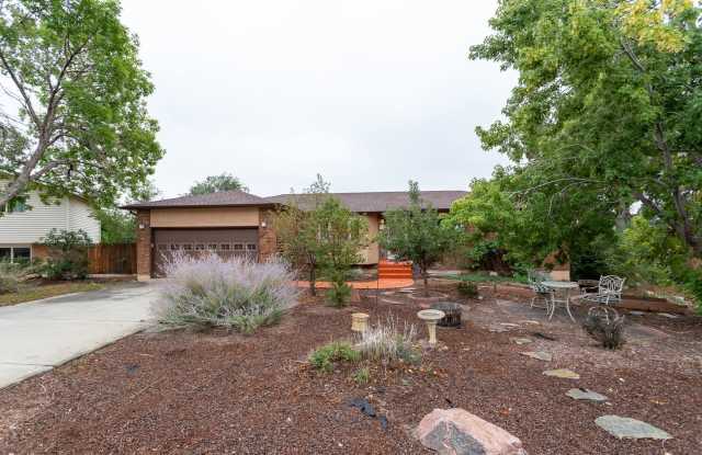 Spacious 5-Bedroom Home w/ A/C near Fort Carson - 518 Catalina Drive, Stratmoor, CO 80906