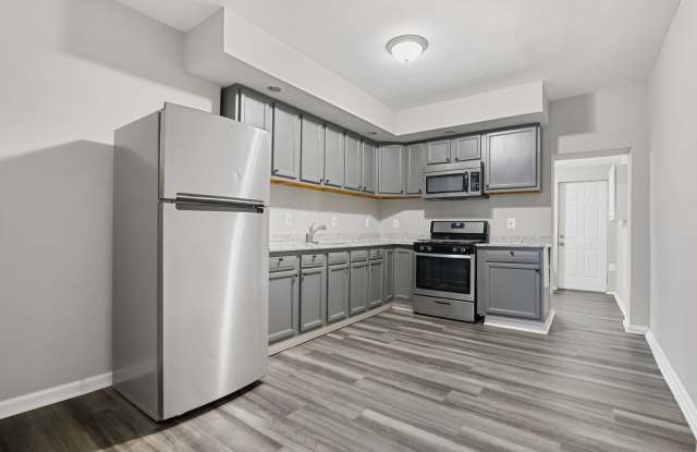 Spacious 4-Bedroom, 1-Bathroom home with Modern Amenities in Downtown Baltimore photos photos