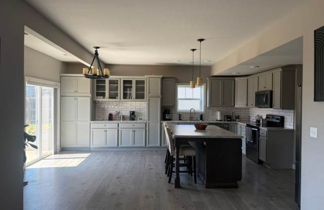 Spacious 4-Bedroom, 2.5-Bathroom 1.5-Story Home with 3-Car Garage photos photos