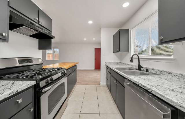 Charming 3BR, 1BA House with Private Backyard photos photos