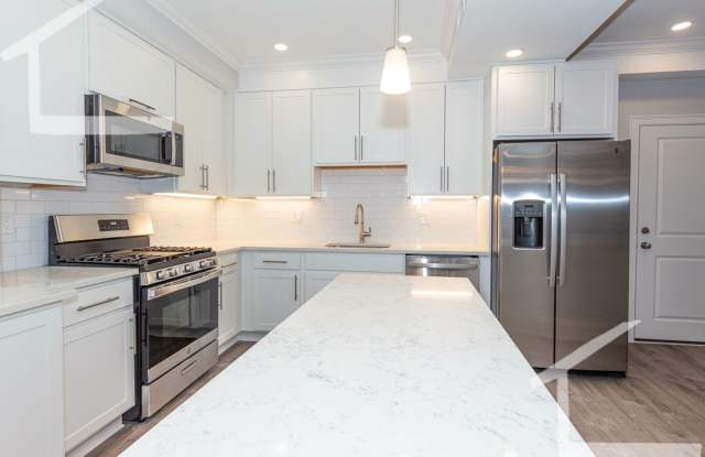 Luxury 4 bed 2 bath, Laundry in Unit--- parking avail to rent photos photos