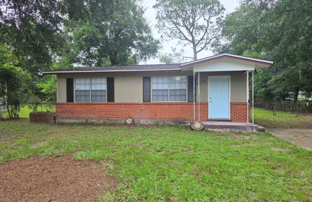 Updated 2BR/1BA home with indoor laundry and fenced yard photos photos