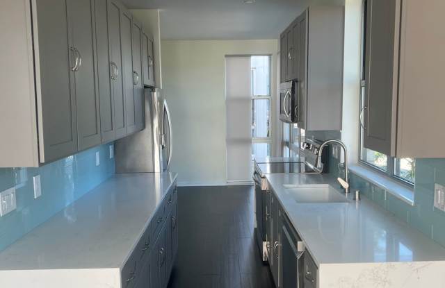Huge 3-Story Riverfront Condo with 2-Car Garage Gallery 3