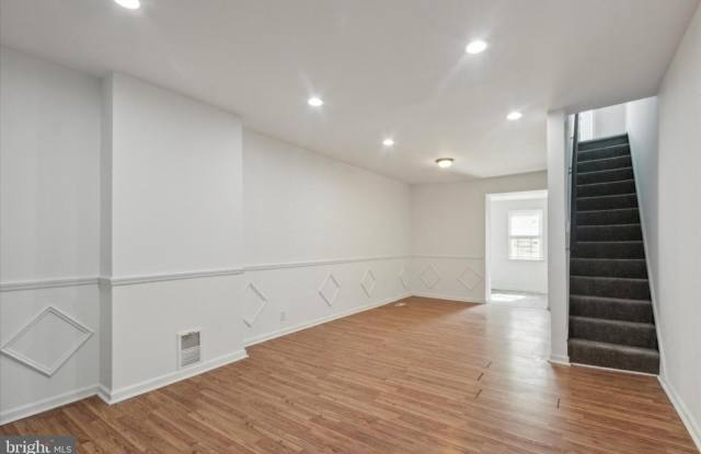 Welcome to this updated 2-bedroom, 1-bathroom row home in the historic Strawberry Mansion neighborhood. photos photos