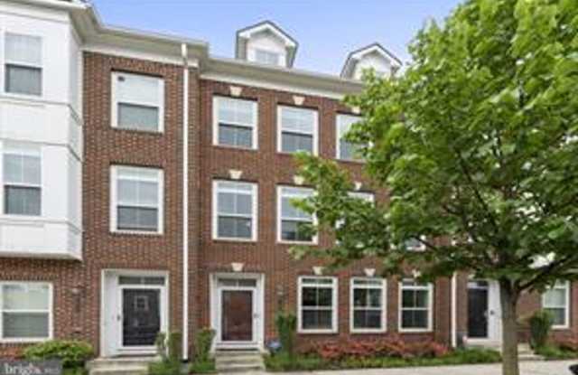 Welcome to 9618 Stockwell Lane—an exceptional 3-level, 4-bedroom, 3.5-bath townhome in the heart of Fairfax that has been thoughtfully updated to offer both style and functionality. photos photos