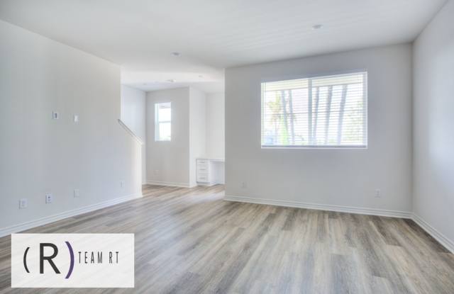 Modern 4-Bedroom Tri-Level Home with EV Charging & Solar in Artesia ! Gallery 1