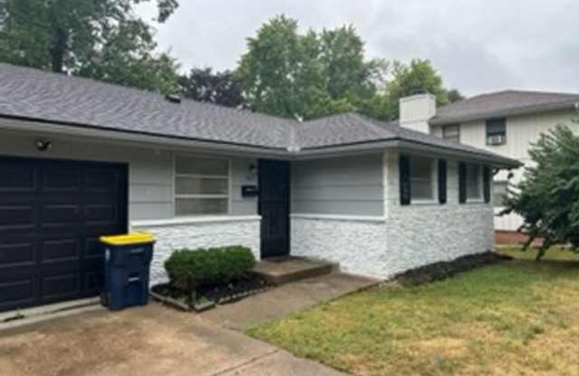 Charming 3-Bed KCMO Ranch with Spacious Backyard & Attached Garage Gallery 1