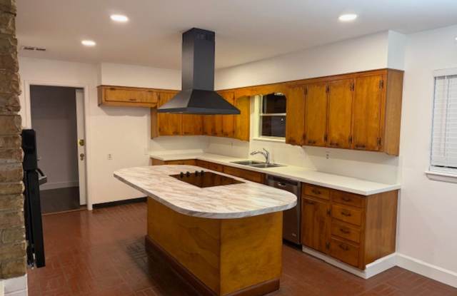 Charming and well-maintained single-family home tucked into one of Norman’s established central neighborhoods. photos photos