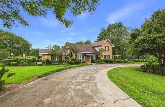 100 Oak Coulee Drive photos photos