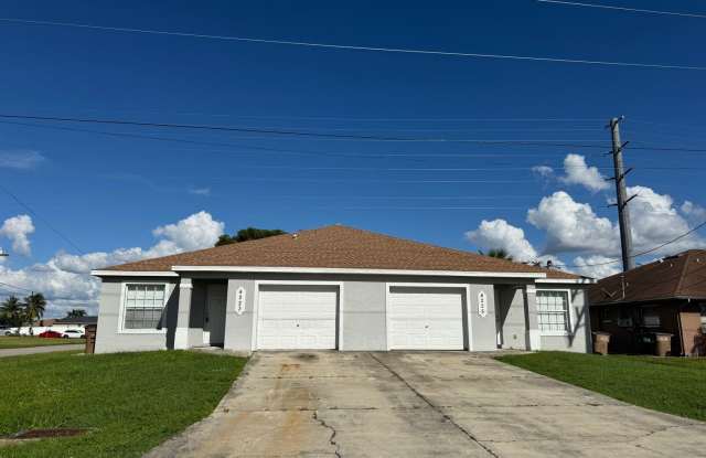 Experience this Cape Coral 3 bedroom 2 bath corner duplex with 1 car garage and screened in lanai. photos photos