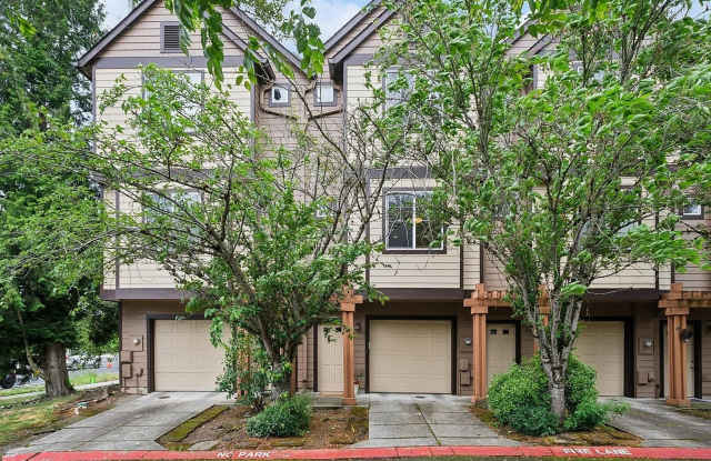 775 SW Dillan Drive ~ Gorgeous Tri-Level Townhome Gallery 1