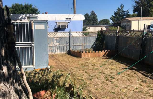 2 bed 1 bath mobile home located on south side of Sterling. Close to park and hospital. - 413 Iris Drive, Sterling, CO 80751