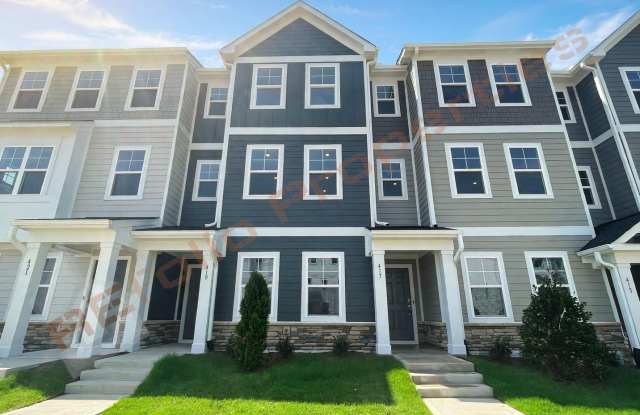 Welcome to this 3 Bedroom, 3.5 Bath Townhome with 1st Floor Guest Suite, 3rd Floor Primary Suite, 1-Car Garage, Driveway Parking & Internet Included in Carolina Springs, Apex – Available Nov 7th! Gallery 1