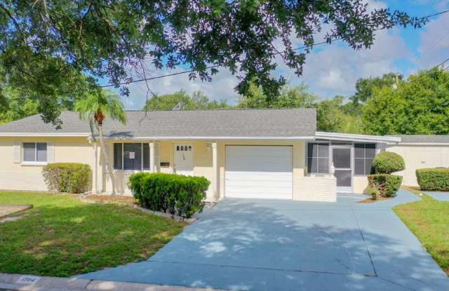 Beautiful 2/2 ~1000Sq. Ft. with NEW floors, recently updated Kitchen with GRANITE!! photos photos