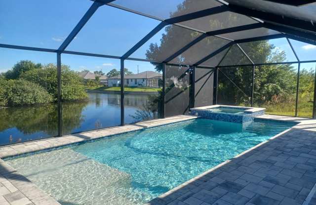 Available Now: Pool Home Overlooking a Canal 3 BR / 2 BA Gallery 1
