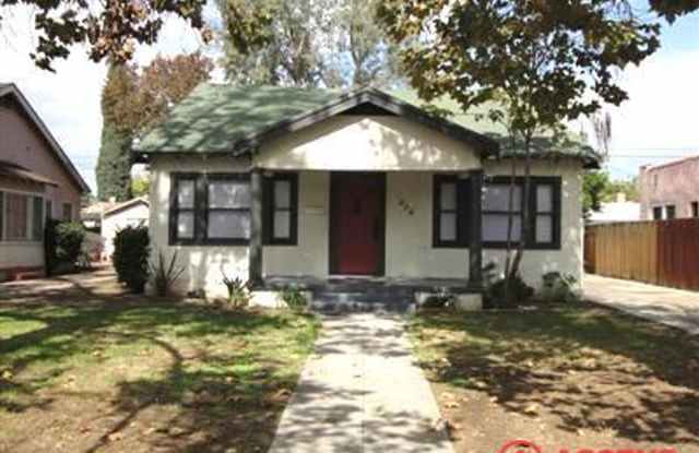 Charming 3BD/1BA Home in Northeast Bakersfield — Brick Fireplace, Prime Location! photos photos