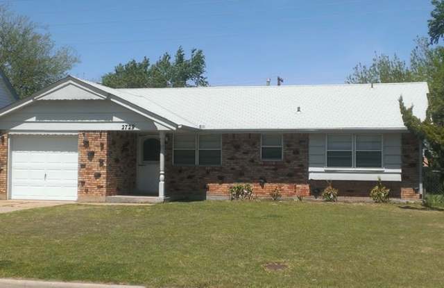 3 beds, 1 1/2 baths and a 1 car garage home for rent in SW OKC! New granite and flooring Gallery 1