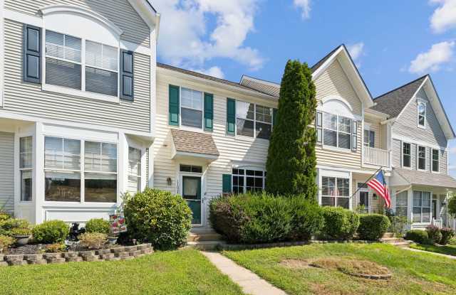 Welcome to 11624 Rumford Court, a beautifully renovated 3-level townhouse in the highly sought-after Ridgeleigh community of Lake Ridge. photos photos