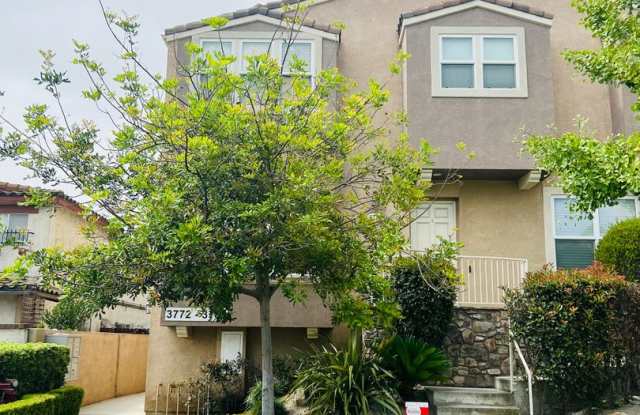 Beautiful 3 story condo with large private patio located in Los Alamitos - 3778 Green Avenue, Los Alamitos, CA 90720