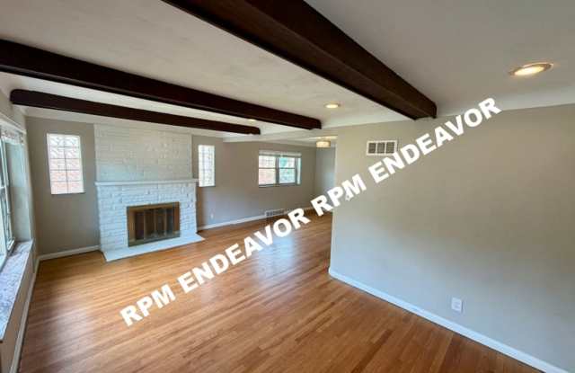 Spacious U-City Home with Finished Lower Level & 2 Car Garage Gallery 4