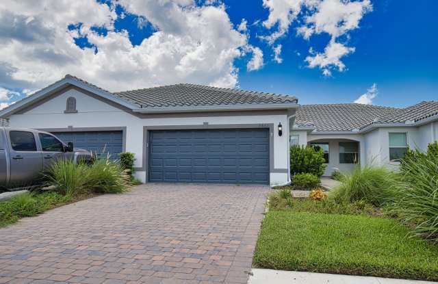 Annual Unfurnished 2 Bedroom Plus Den, 2 Bath, Two Car Garage, Twin Villa – located in BeachWalk Community 2.5 Miles from Manasota Beach Key! - 9861 Bright Water Drive, Sarasota County, FL 34223