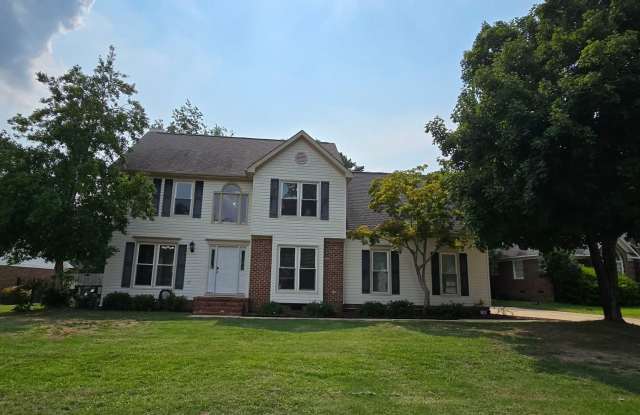 Welcome home to this beautiful rental located just off Country Club Drive on the highly sought-after north side of town! Gallery 3