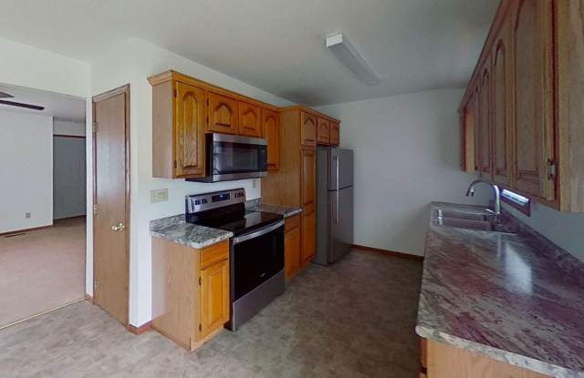Two story duplex with two large bedrooms, walk in closet, one and a half bath, full basement. photos photos
