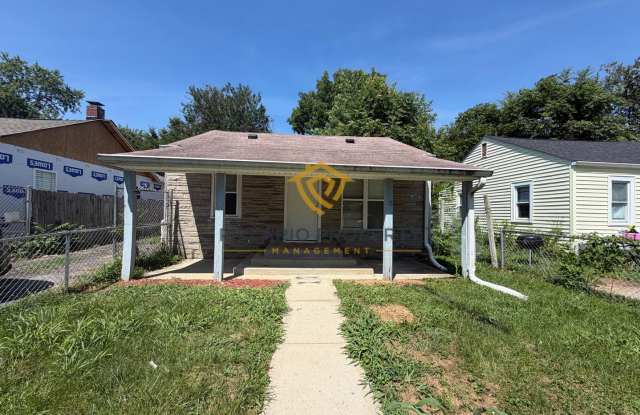 Charming 3-Bedroom Stone Bungalow with 2-Car Detached Garage & Fenced Yard, Available NOW! photos photos