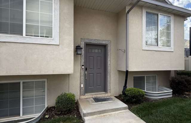 Welcome home to this spacious 4-bedroom, 3-bath residence in Spanish Fork, UT! Gallery 1