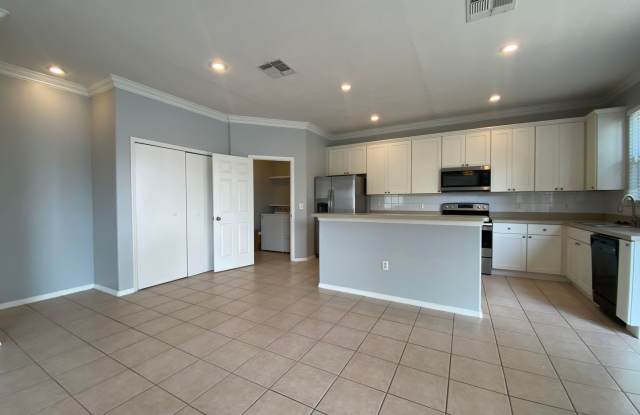 Stunning 4 Bedroom, 2.5 Bath Home in Meadow Woods – Water-view, Fenced Yard  Community Amenities! - 2043 Meadow Pond Way, Meadow Woods, FL 32824