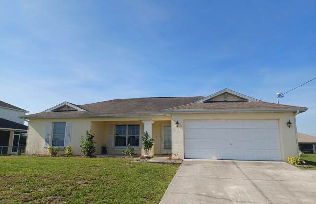 Single Family 3/2 with a Fenced Yard - 1124 Diplomat Parkway West, Cape Coral, FL 33993