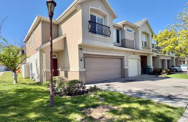 Spacious 3 Bed Townhome in West Valley City with Gated Yard, Garage & Pool photos photos