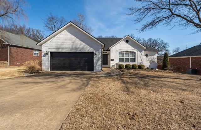 Newly Renovated 4 Bed, 2 Bath Gem in Prime Rogers Location! photos photos