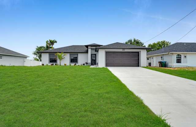 Be the first in occupy this 2025 constructed home in the vibrant city of Cape Coral, FL! Qualify for a deposit-free option and save on move-in costs! photos photos