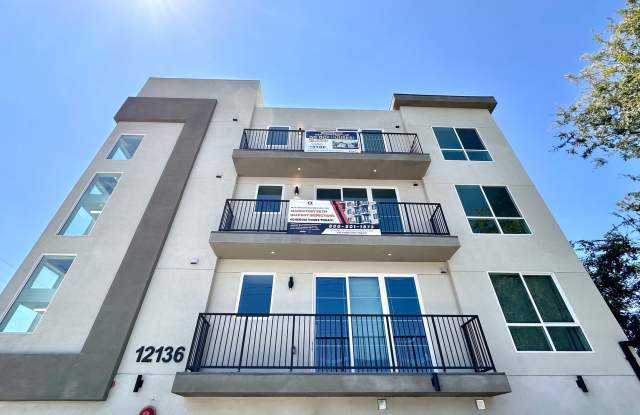 Modern 1-Bedroom Retreat with Sleek Finishes in Brand-New Building photos photos