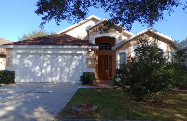 4-bedroom, 2.5-bath single-family home with a private pool located in Orlando photos photos