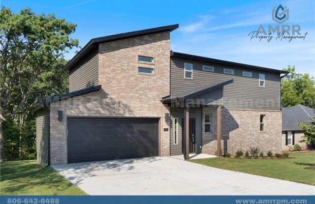 New Beginnings Start with AMRR: Charming 2-Bedroom, 2.5-Bath Single-Family Home in Bella Vista Gallery 1