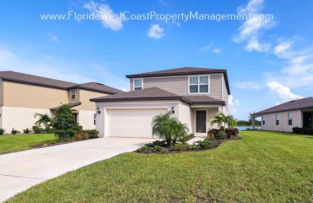 OUTSTANDING LARGE 4 BEDROOM/ 3 BATH HOME IN ISLES AT BAYVIEW! LARGE FLEX SPACE PLUS LAKEIVEWS! photos photos