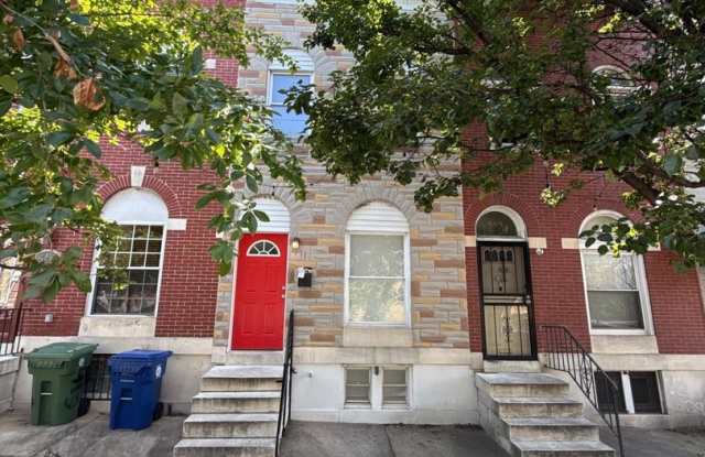 Charming Baltimore Rowhome with Private Deck & Exposed Brick Gallery 3