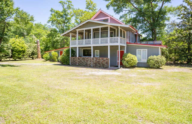 UNFURNISHED - 2 Bed 2 Bath + HUGE BONUS in a wooded oasis - NO HOA - off Middle Sound Loop photos photos