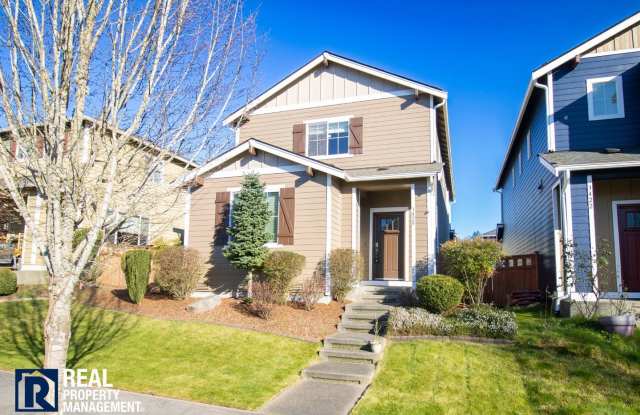 Spacious 4-Bedroom Home with Fenced Yard  2-Car Garage Near JBLM! photos photos