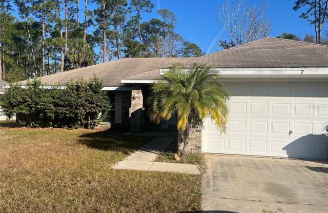 7 POINSETTIA - 7 Poinsettia Lane, Palm Coast, FL 32164