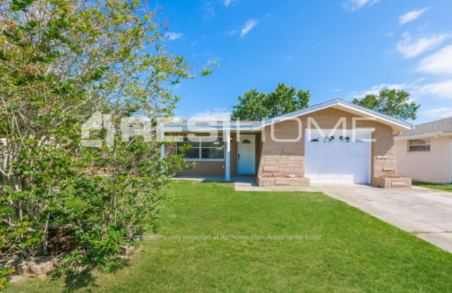 7301 Moravian Drive - 7301 Moravian Drive, Jasmine Estates, FL 34668