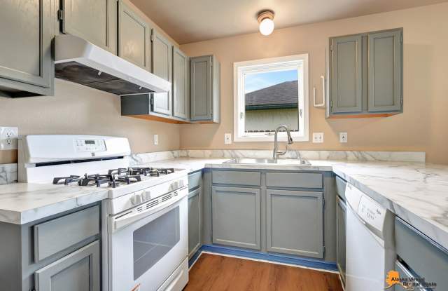 East Anchorage Home with In Unit Laundry and Fenced in Yard - 7620 Regal Mountain Drive, Anchorage, AK 99504