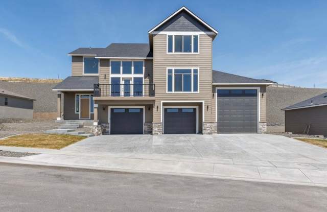 Luxury 4 Bedroom Home in Southridge w/4 car garage and RV Bay!! photos photos