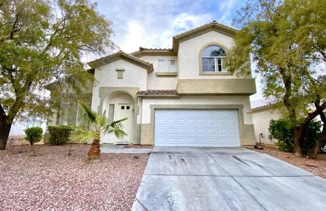 Perfect family home in Rhodes Ranch guard gated golf course community with a full bedroom and bathroom on the first floor! photos photos